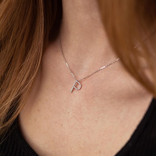 Золоте кольє з літерою 