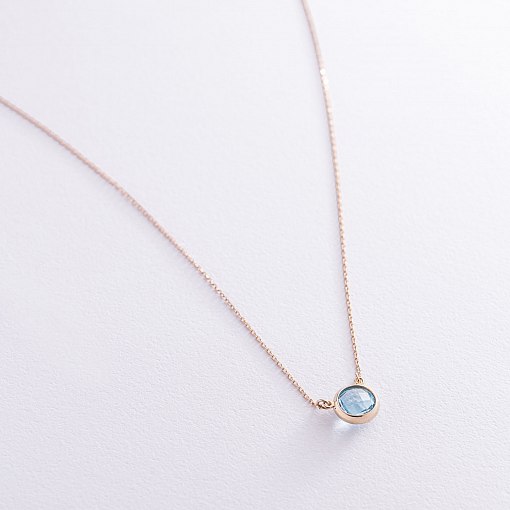 Кольє із блакитним топазом в червоному золоті кол01182