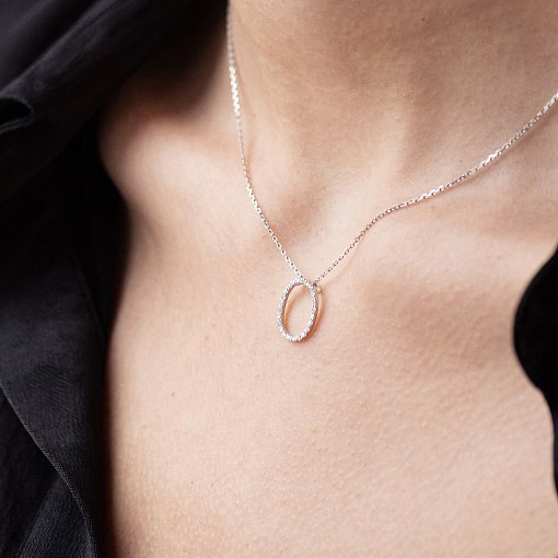 Золоте кольє з літерою 