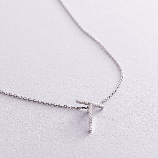 Золоте кольє з літерою 