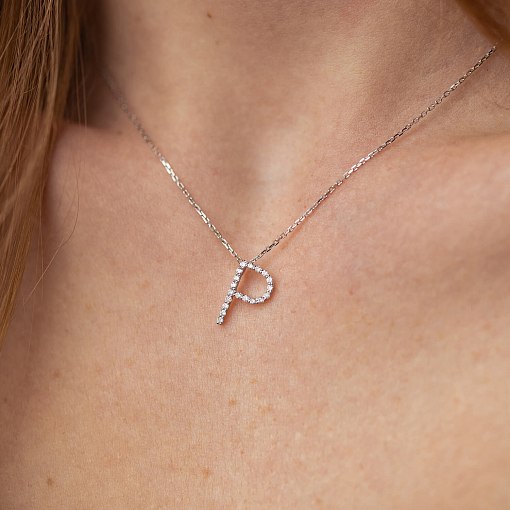 Золоте кольє з літерою 