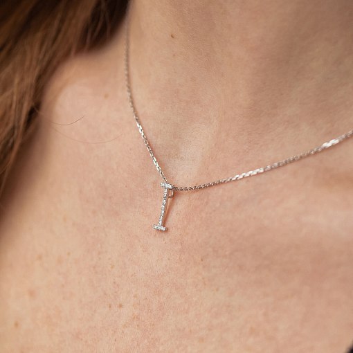 Золоте кольє з літерою 