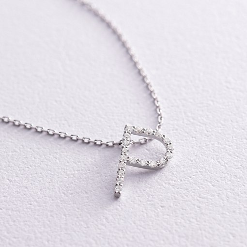 Золоте кольє з літерою 