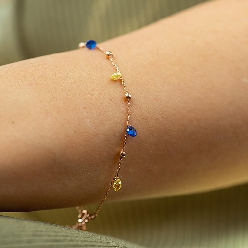 Золотой браслет "Независимая" с шариками (синие и желтые фианиты) б05326 2
