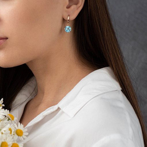 Золотые серьги "Влечение" с голубыми топазами с05295 12