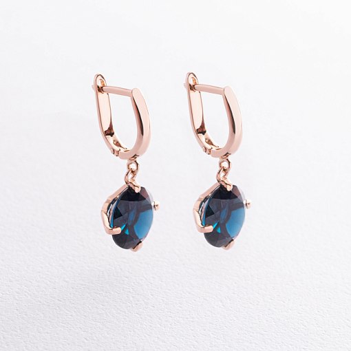 Золотые серьги "Влечение" с синт. топазом с08573