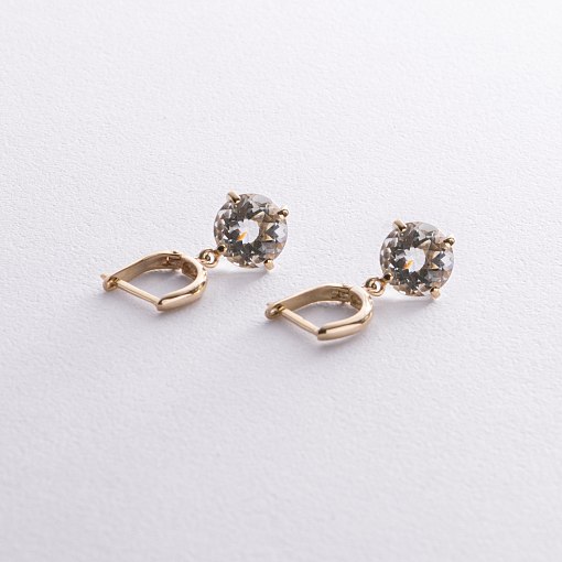 Золотые серьги "Влечение" с зеленым аметистом с08528 4