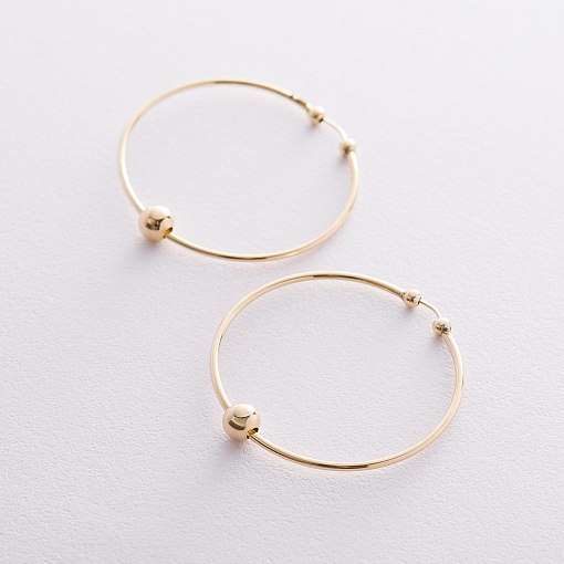 Серьги - кольца Гармония в желтом золоте с06691