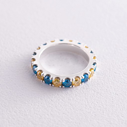 Серебряное кольцо с дорожкой голубых и желтых камней 112664 7
