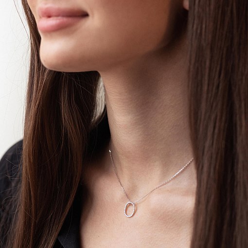 Золоте кольє з літерою 