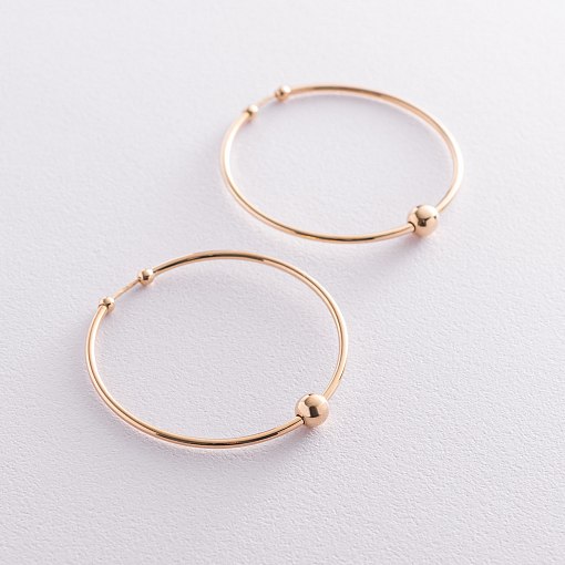 Серьги - кольца "Гармония" в желтом золоте с07326