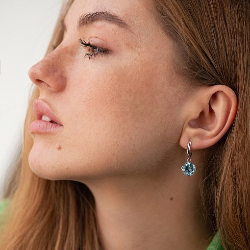 Серьги "Влечение" с голубыми топазами в белом золоте с05290 5