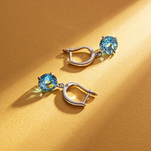 Серьги "Влечение" с голубыми топазами в белом золоте с05290 3
