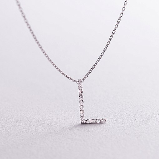 Золоте кольє з літерою 