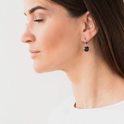 Золотые серьги "Влечение" с пиропом с05289 4