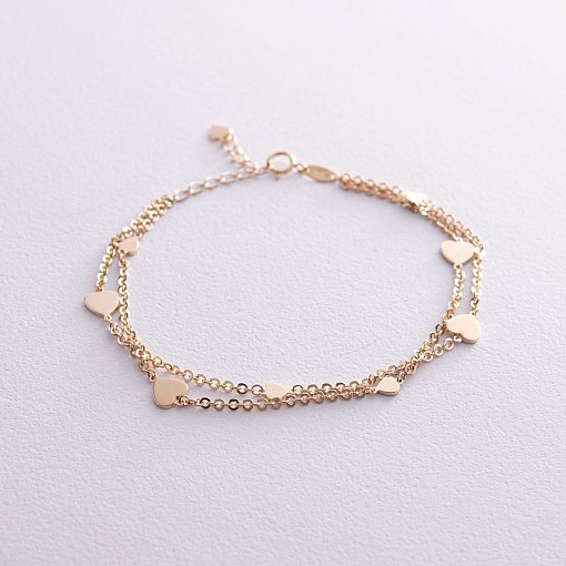 Двойной браслет "Сердечки" в желтом золоте б05196