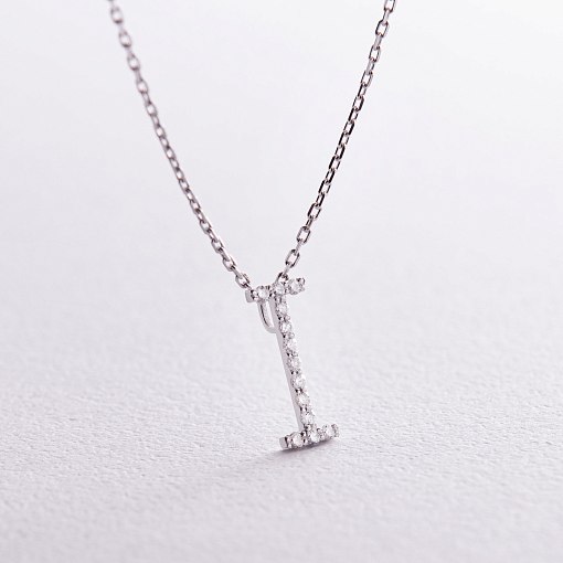 Золоте кольє з літерою 