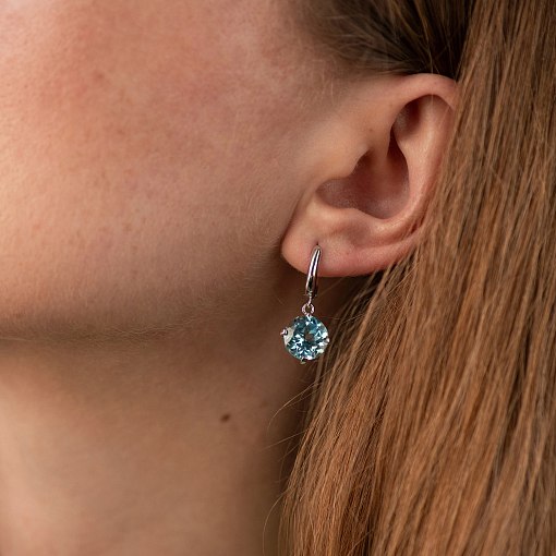 Серьги "Влечение" с голубыми топазами в белом золоте с05290 2