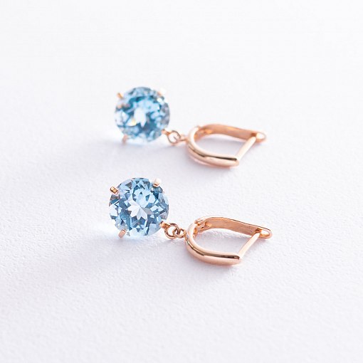 Золотые серьги "Влечение" с голубыми топазами с05295 4