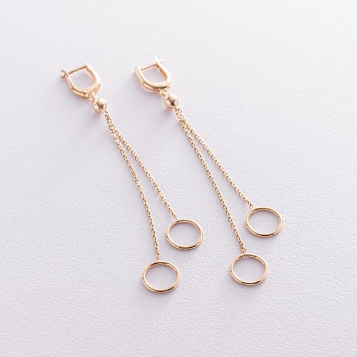 Золотые серьги "Круговорот на цепочке" с07310