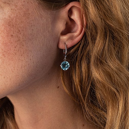 Золотые серьги "Влечение" с голубым топазом с08003 2