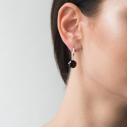 Золотые серьги "Влечение" с пиропом с05289 2