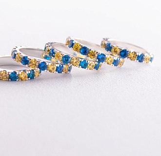 Срібна каблучка з доріжкою блакитного та жовтого каміння 112664 №4