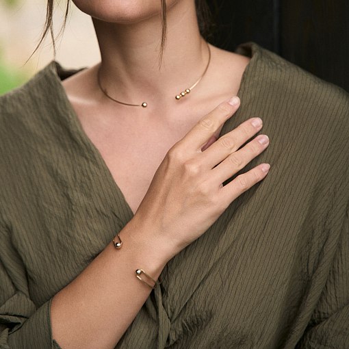 Жесткий браслет "Marlene" с шариками (желтое золото) б05603 10