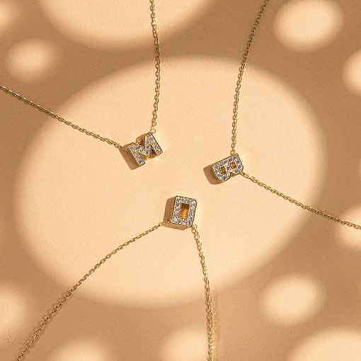 Кольє з буквою 