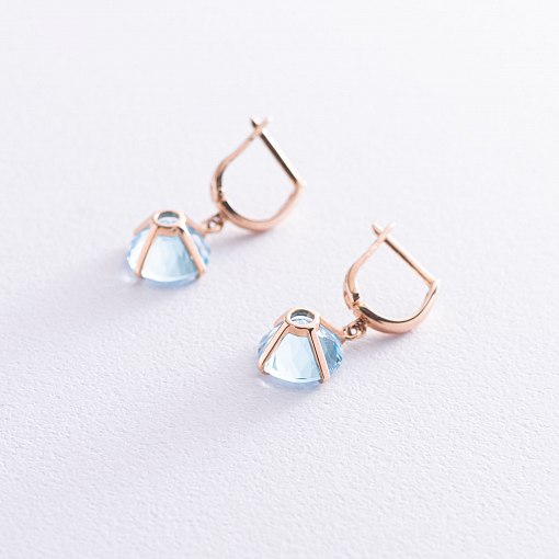 Золотые серьги "Влечение" с голубыми топазами с05295 7