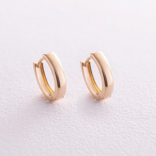 Серьги - кольца в желтом золоте (овальные) с08107