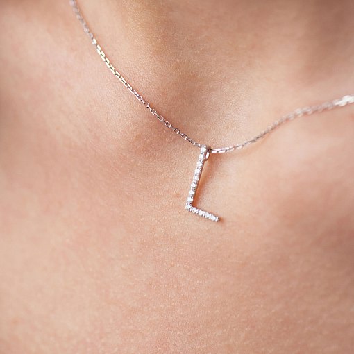 Золоте кольє з літерою 