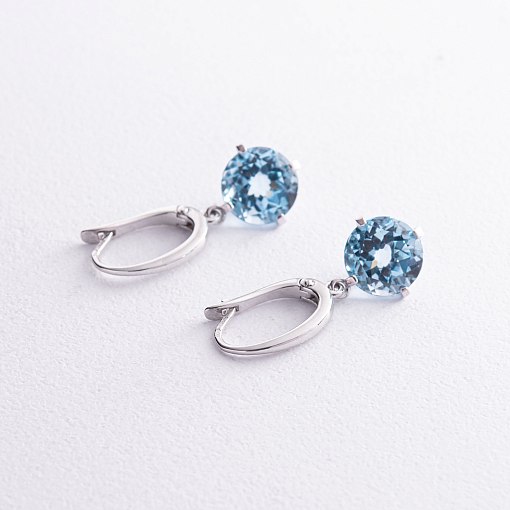 Золотые серьги "Влечение" с голубым топазом с08003 3