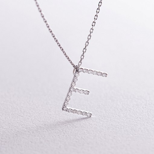 Золоте кольє з літерою 